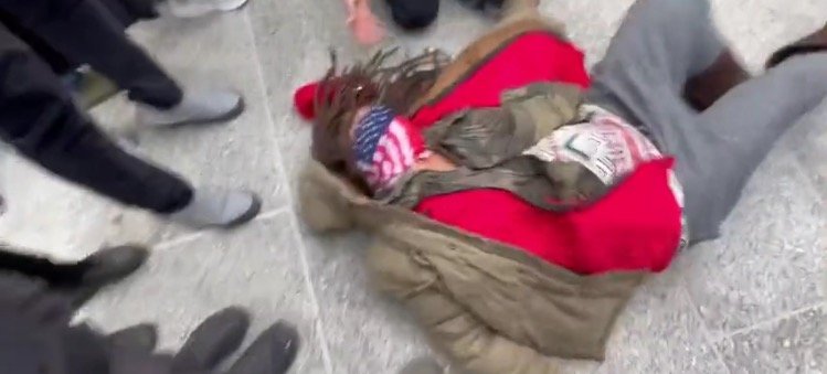 Distressed Woman Yells “F*ck America!” Before Having a ‘Seizure’ on Kenosha Courthouse Steps After Rittenhouse Found Not Guilty (VIDEO)