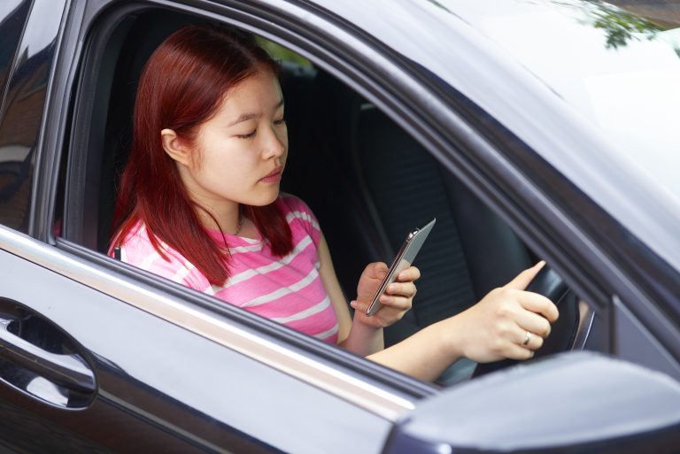 UK to ban any handheld use of a mobile phone behind the wheel