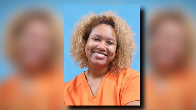 Woman Smiles in Mugshot After Killing Boyfriend with Sword on Christmas Eve