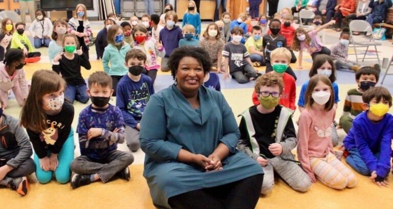 Stacey Abrams Panics, Deletes Maskless Photo of Her Surrounded by Masked Children During Visit to Georgia Elementary School