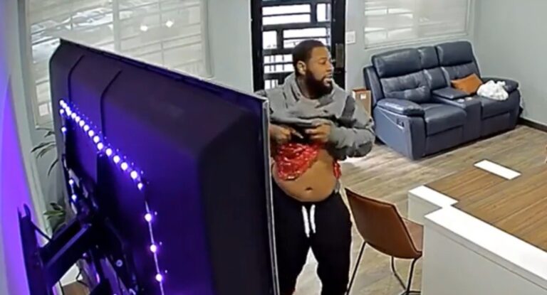 Armed Robbery Suspect Changes His Mind, Darts Out of Houston Car Dealership After Realizing Employee Had a Gun Too (VIDEO)
