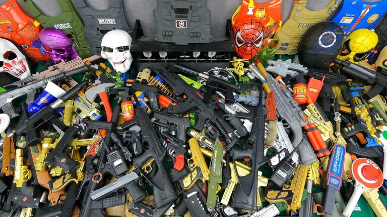 Special Horror Masks, A Black Huge Table of Toy Guns, Rifles, Sniper Rifles And Equipment